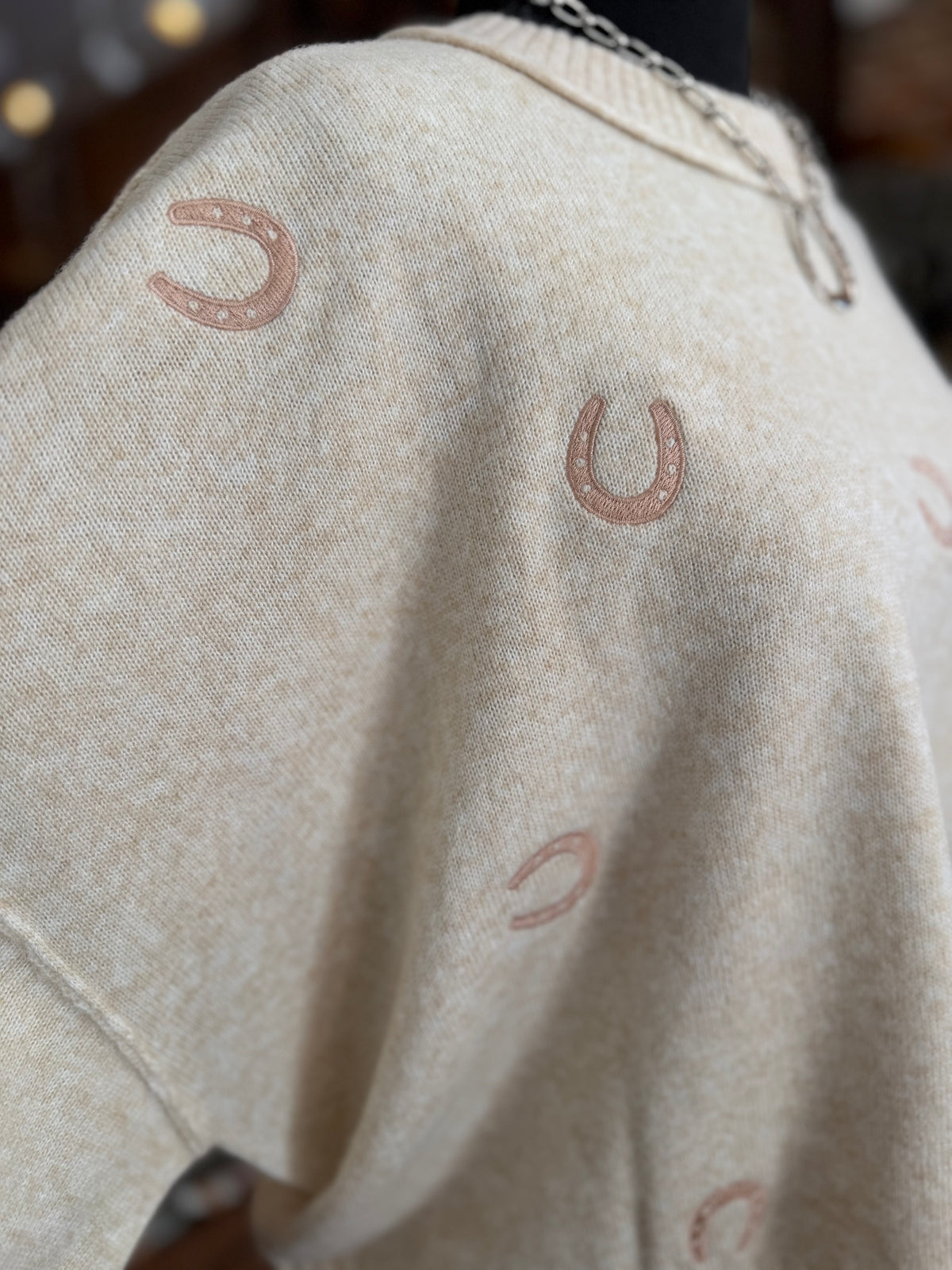 Lucky All Over – Oat Horseshoe Sweater