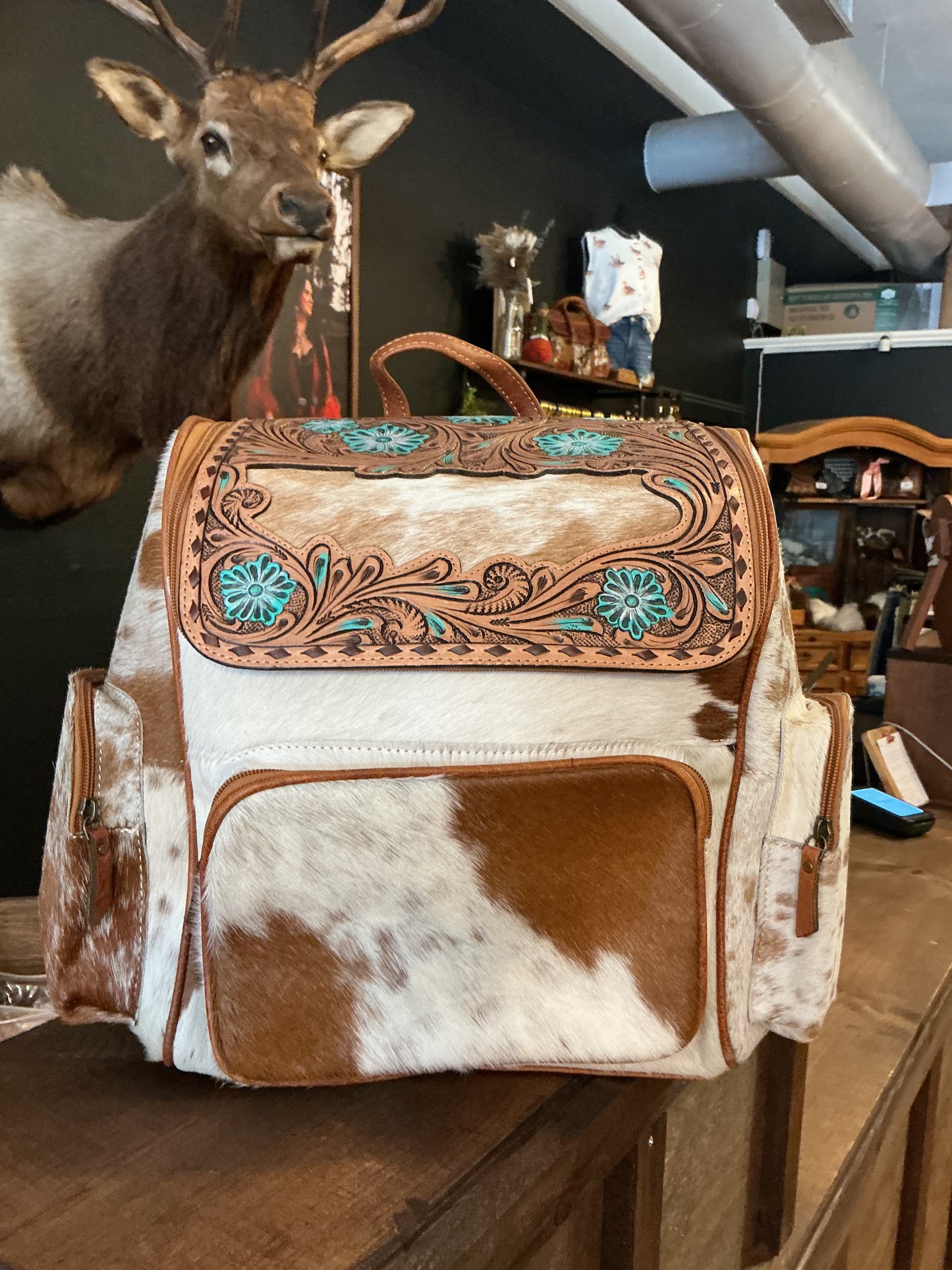 Cowhide & Turquoise Tooled Leather Backpack