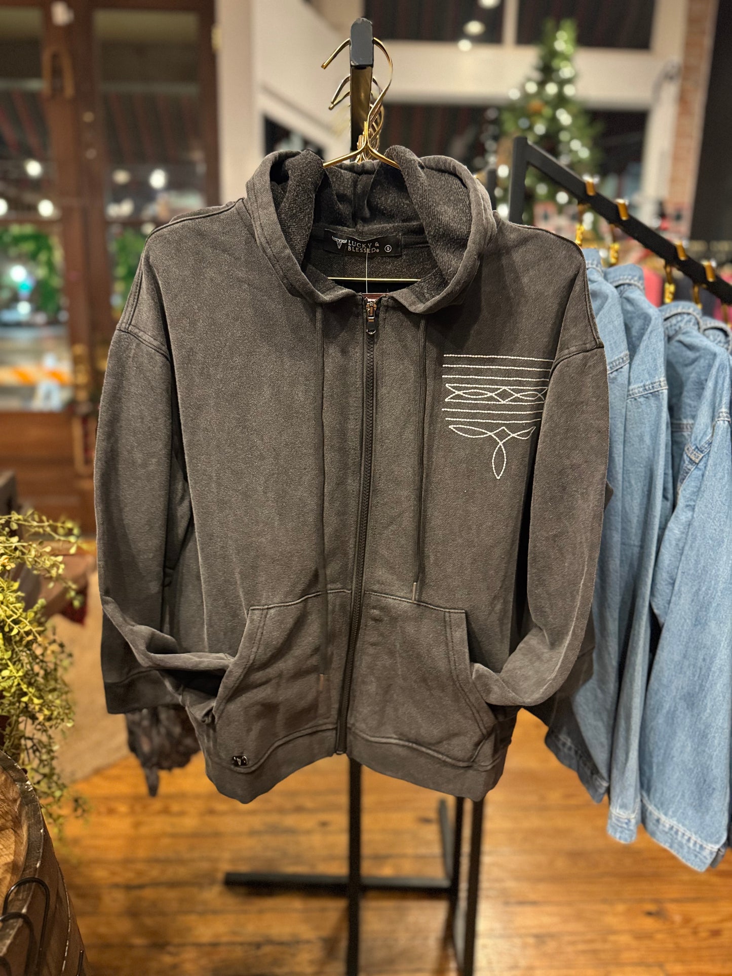 Saddle Stitch – Black Zip-Up Sweatshirt