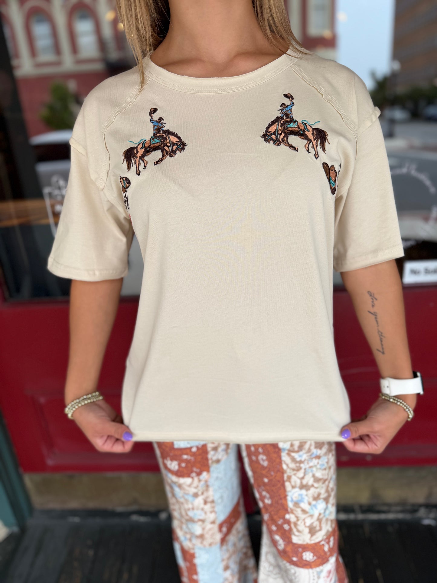Bronc Rider Legacy – Sand Embroidered Tee