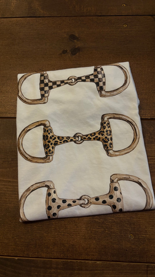 Bit & Bold – White Mixed Print Snaffle Tee