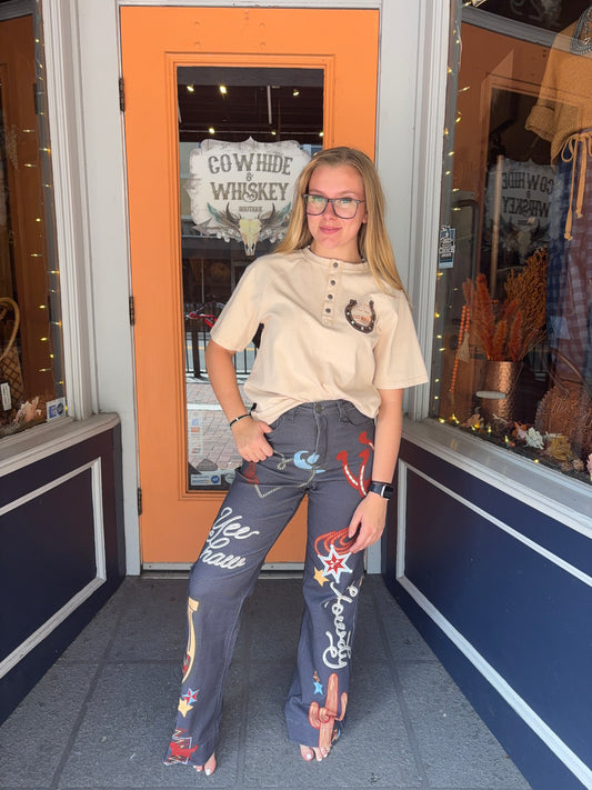 Cowgirl Ink –  Graphic Wide Leg Jeans