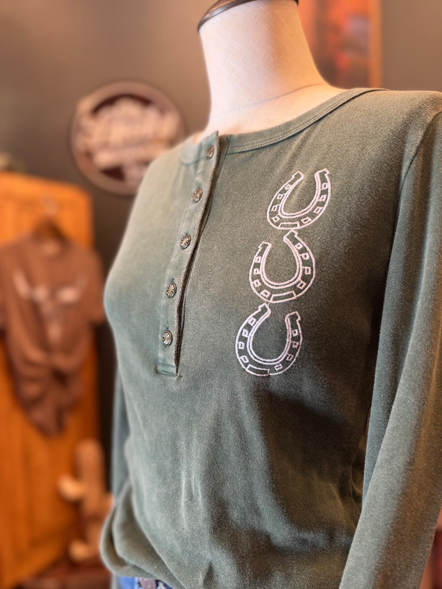 Lucky Spur – Green Horseshoe Embroidered Henley Top