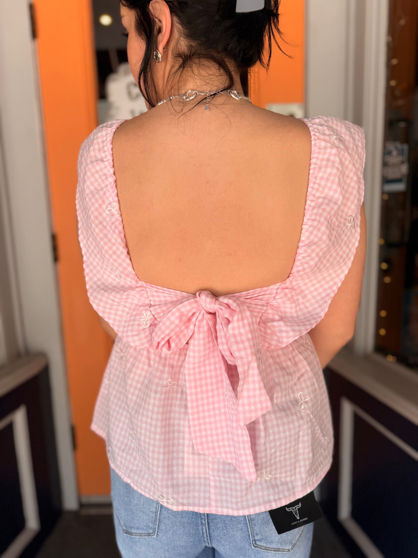 Blush Bow Belle – Gingham Peplum Top